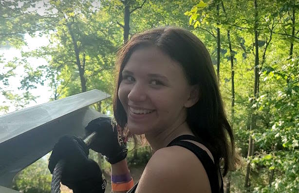 Julia in the tree tops, ziplining