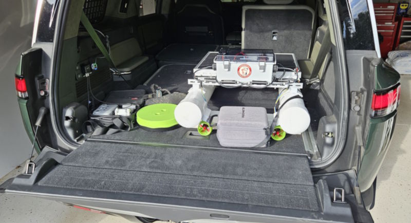 Helios 1 in the back of a Rivian R1S cargo area